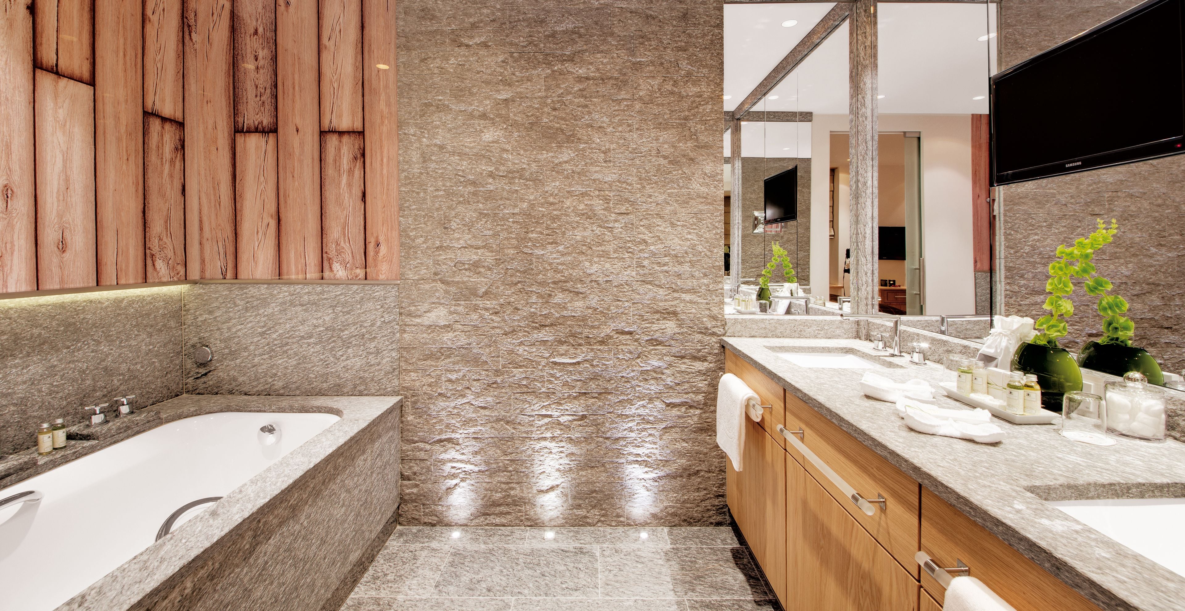 designer toiletries, hair dryer, bathrobes, slippers