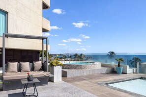 Outdoor pool, open 9:00 AM to 9:00 PM, pool umbrellas, sun loungers