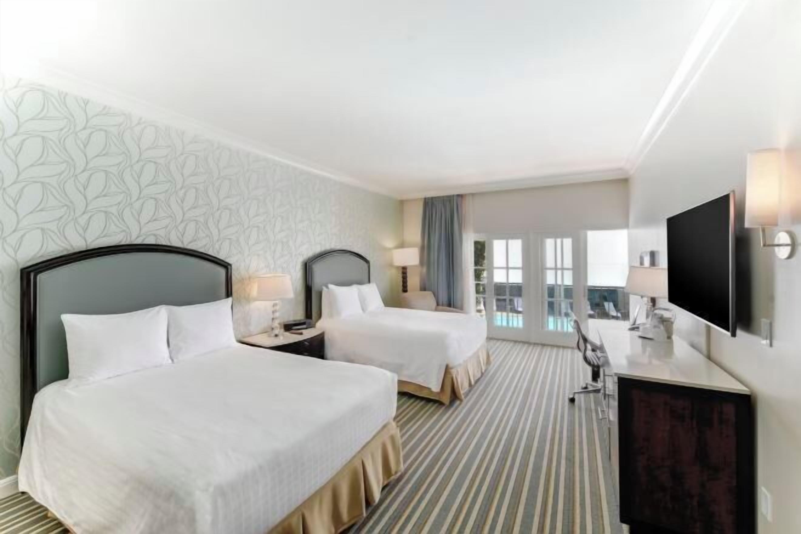 Premium bedding, pillowtop beds, minibar, in-room safe