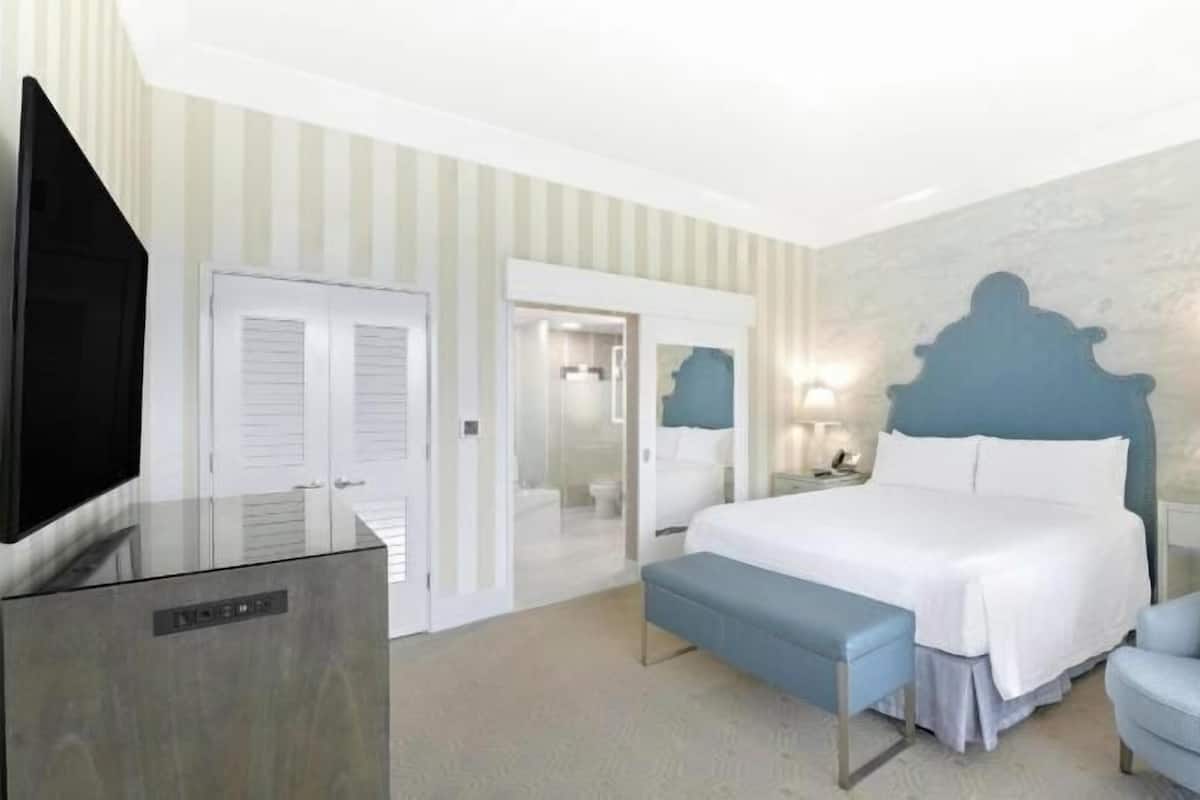 Premium bedding, pillow-top beds, minibar, in-room safe