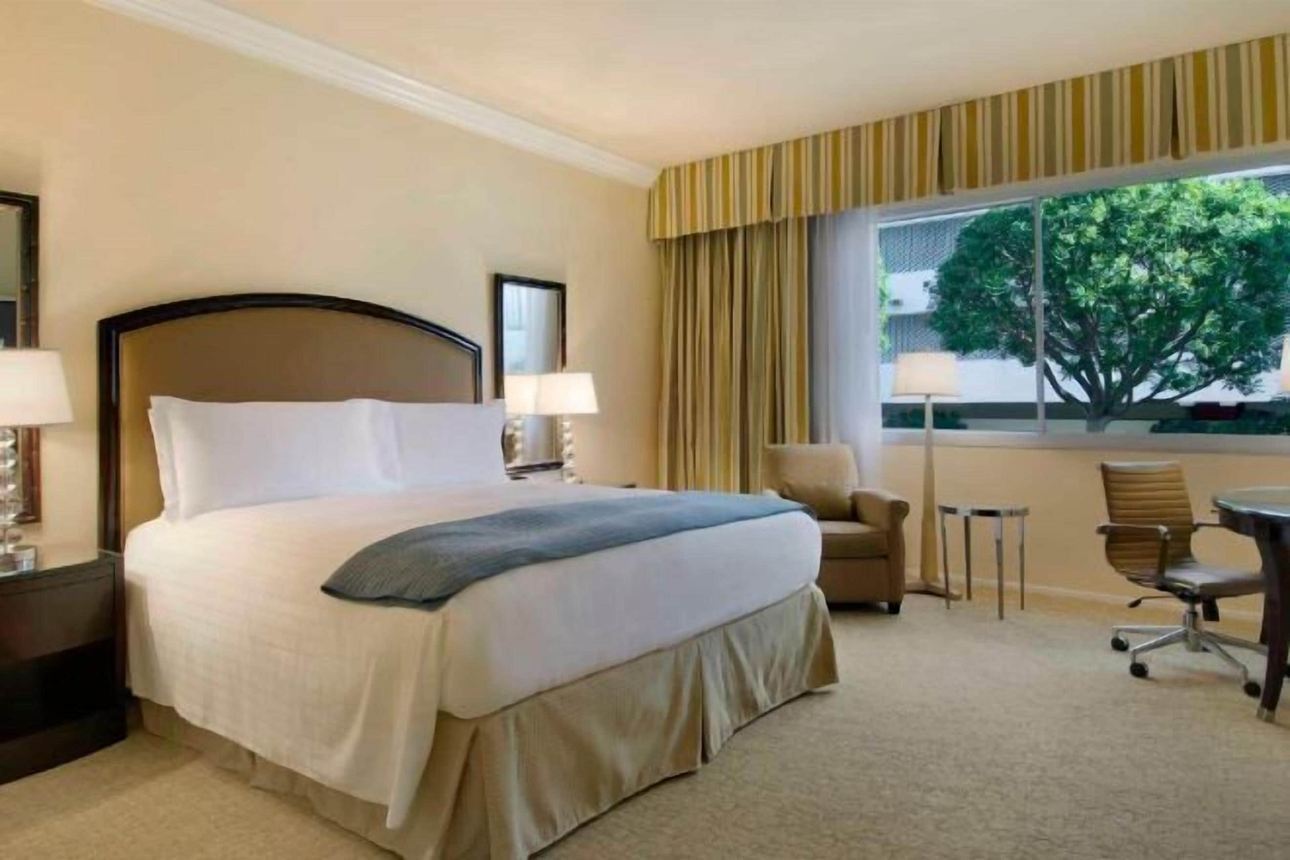 Premium bedding, pillowtop beds, minibar, in-room safe