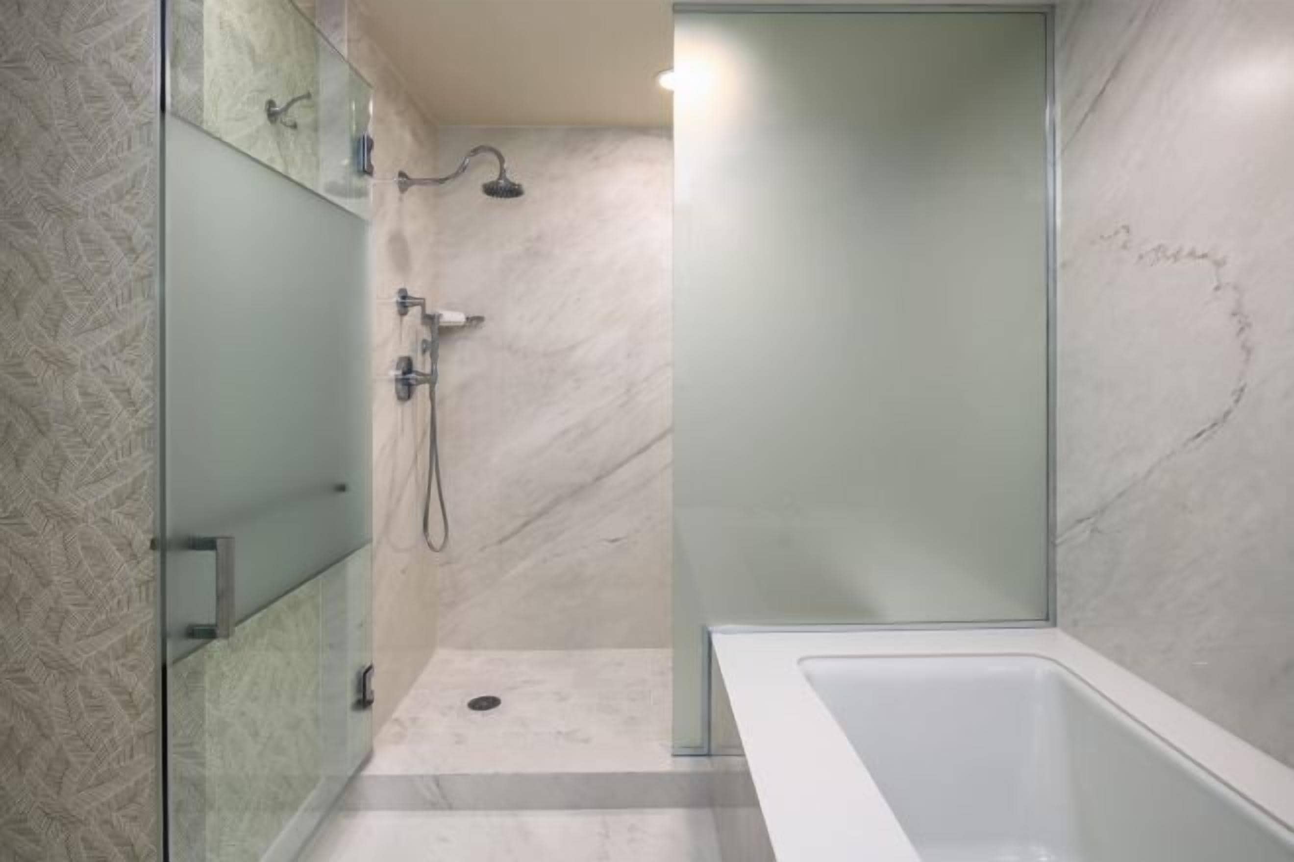 Designer toiletries, hair dryer, bathrobes, slippers