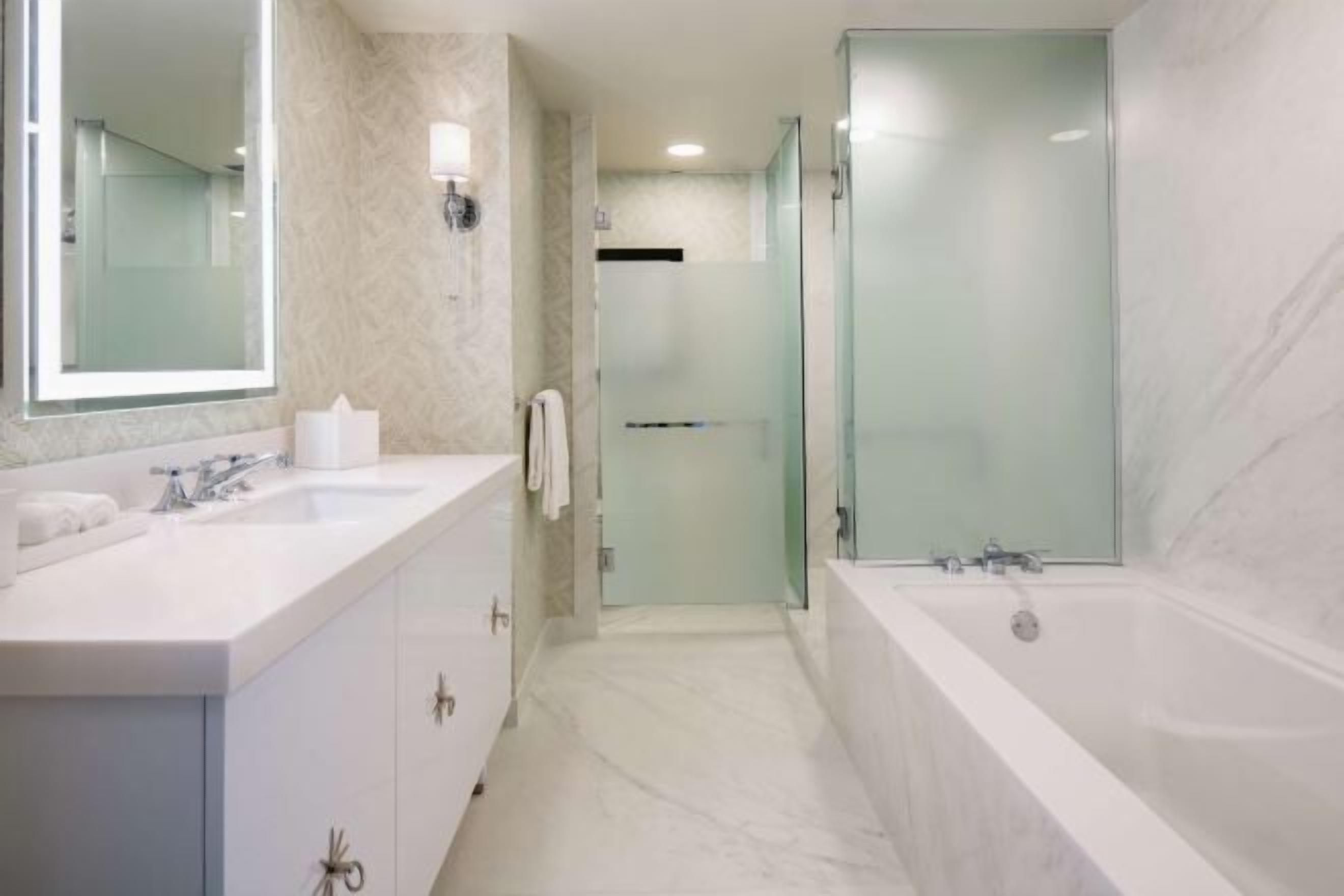 Bathroom | Designer toiletries, hair dryer, bathrobes, slippers