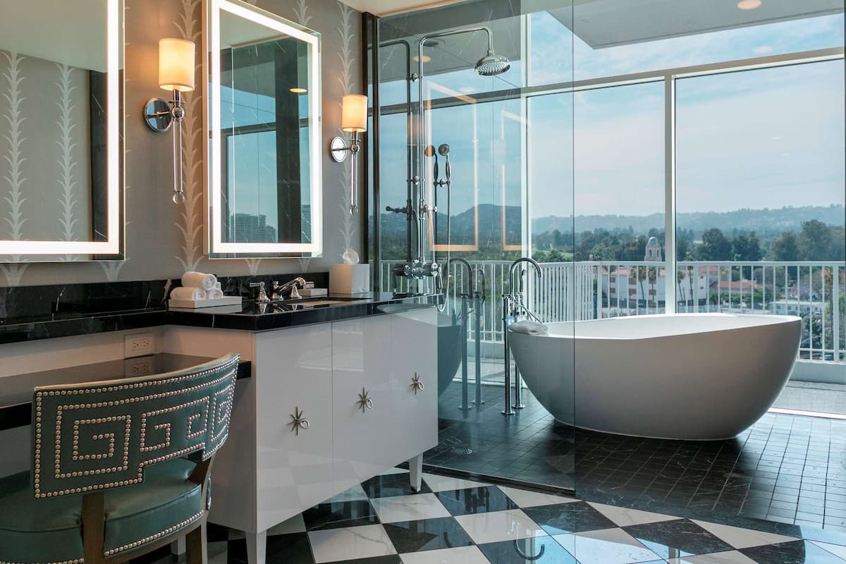 presidential suite | bathroom | designer toiletries, hair dryer, bathrobes, slippers