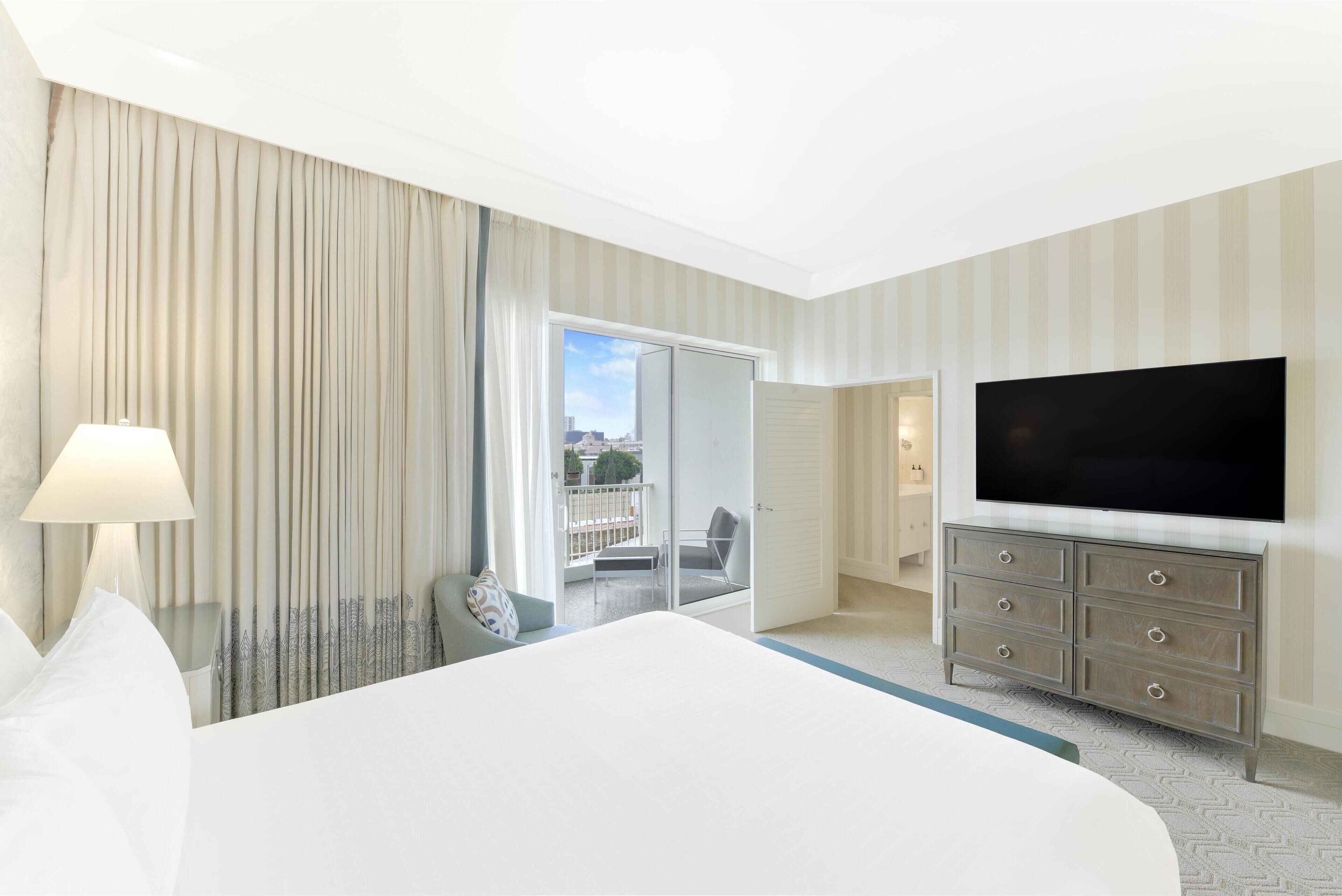 Beverly Hills Retreat Suite | Living area | 55-inch LCD TV with cable channels, Smart TV, pay films