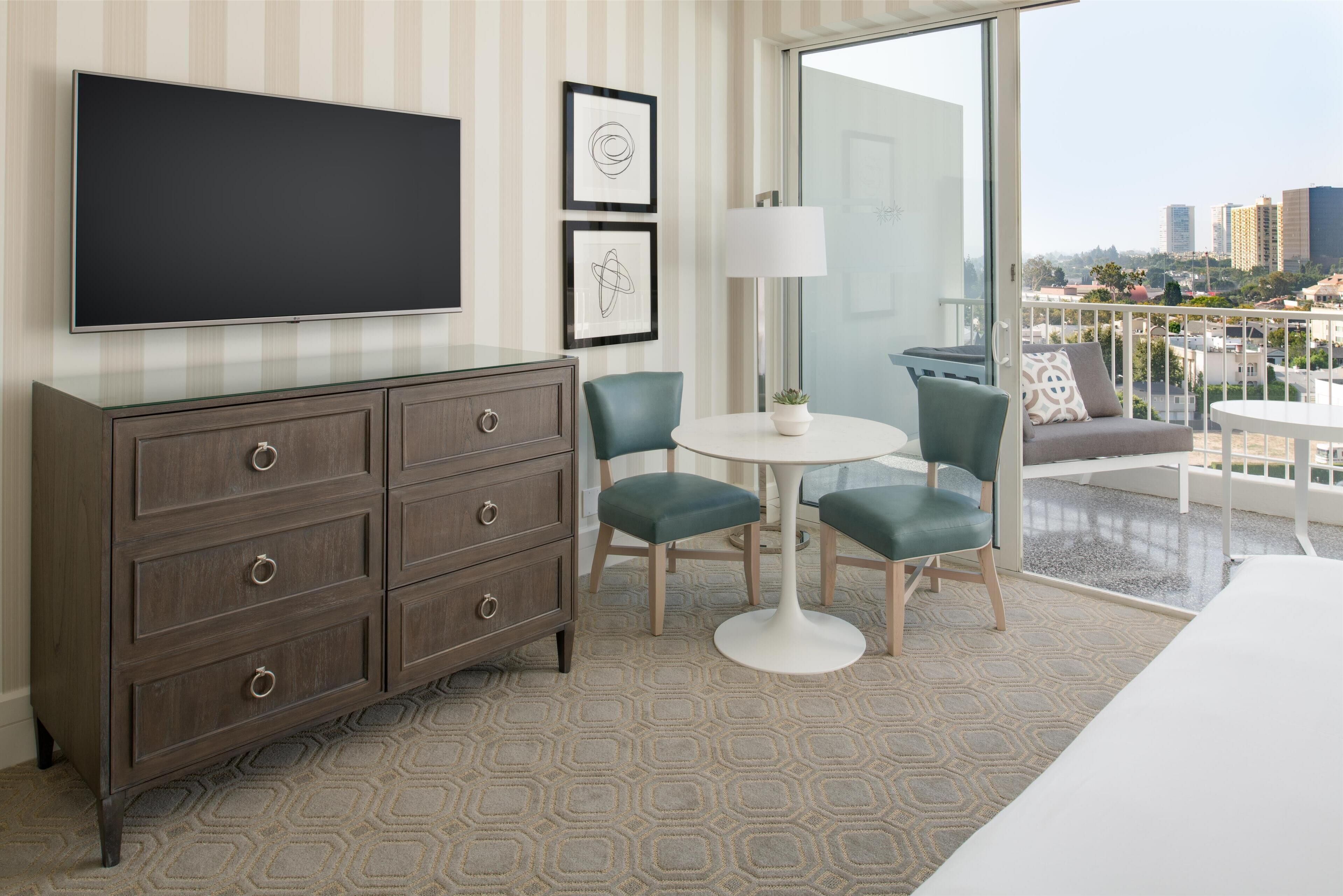 55-inch LCD TV with cable channels, Smart TV, pay movies