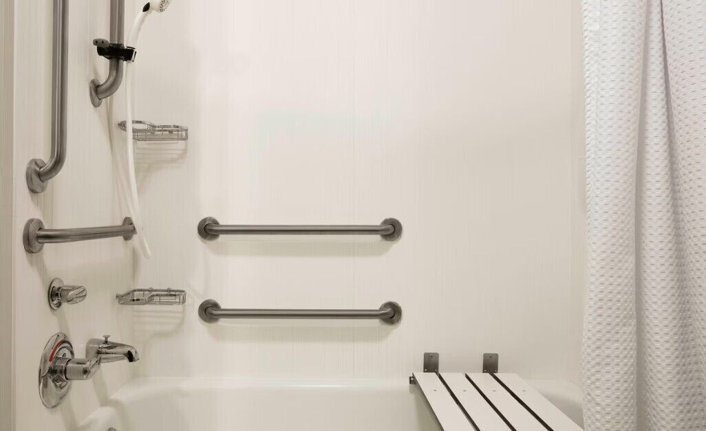 room, 2 queen beds (mobility accessible, tub) | bathroom | combined shower/bathtub, designer toiletries, hair dryer, towels