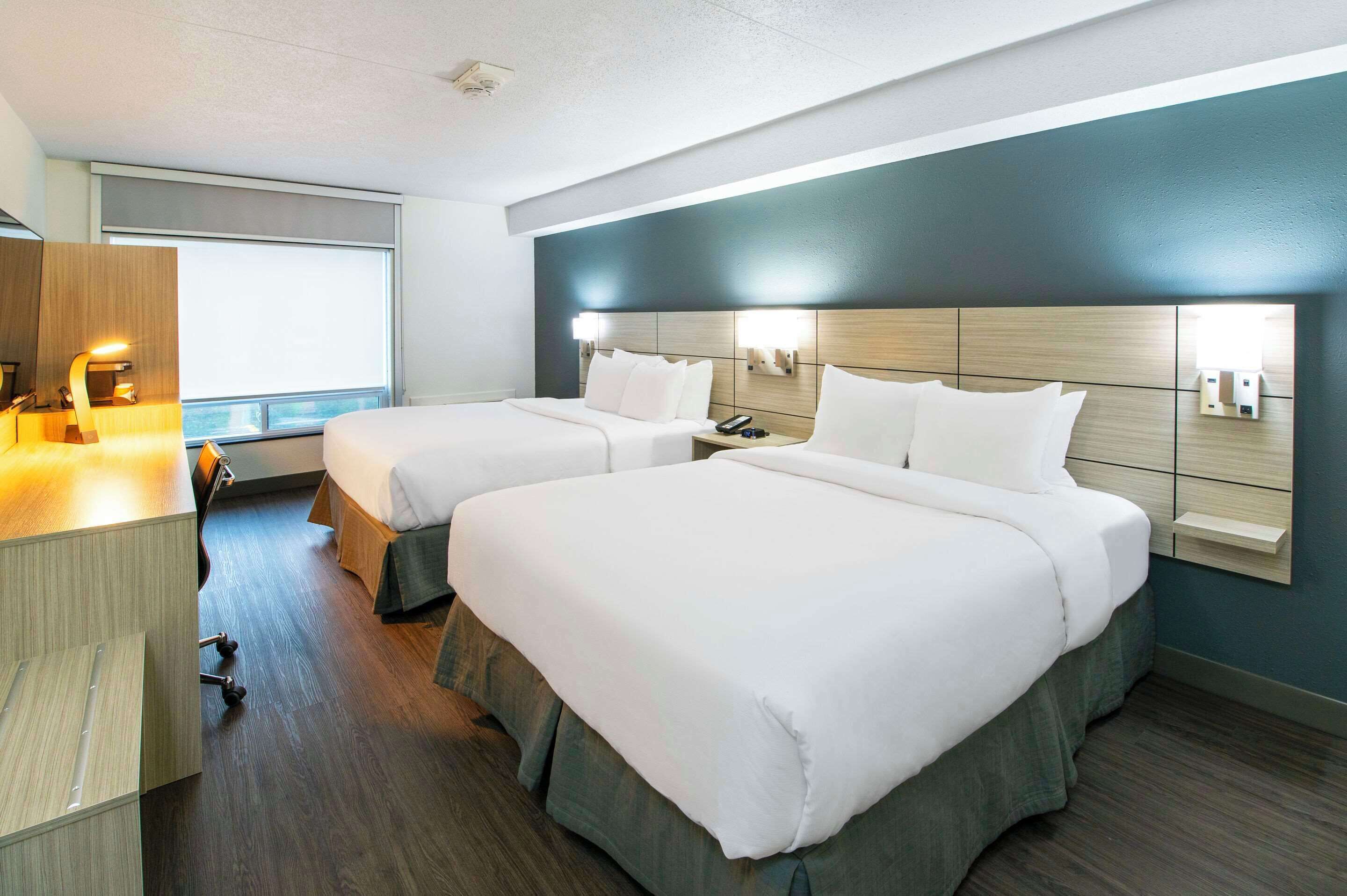 Room, 2 Queen Beds, Non Smoking (Top Floor) | Desk, blackout curtains, iron/ironing board, bed sheets