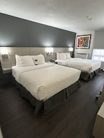 Desk, blackout drapes, iron/ironing board, bed sheets