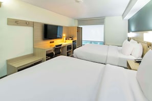 Desk, blackout curtains, iron/ironing board, bed sheets