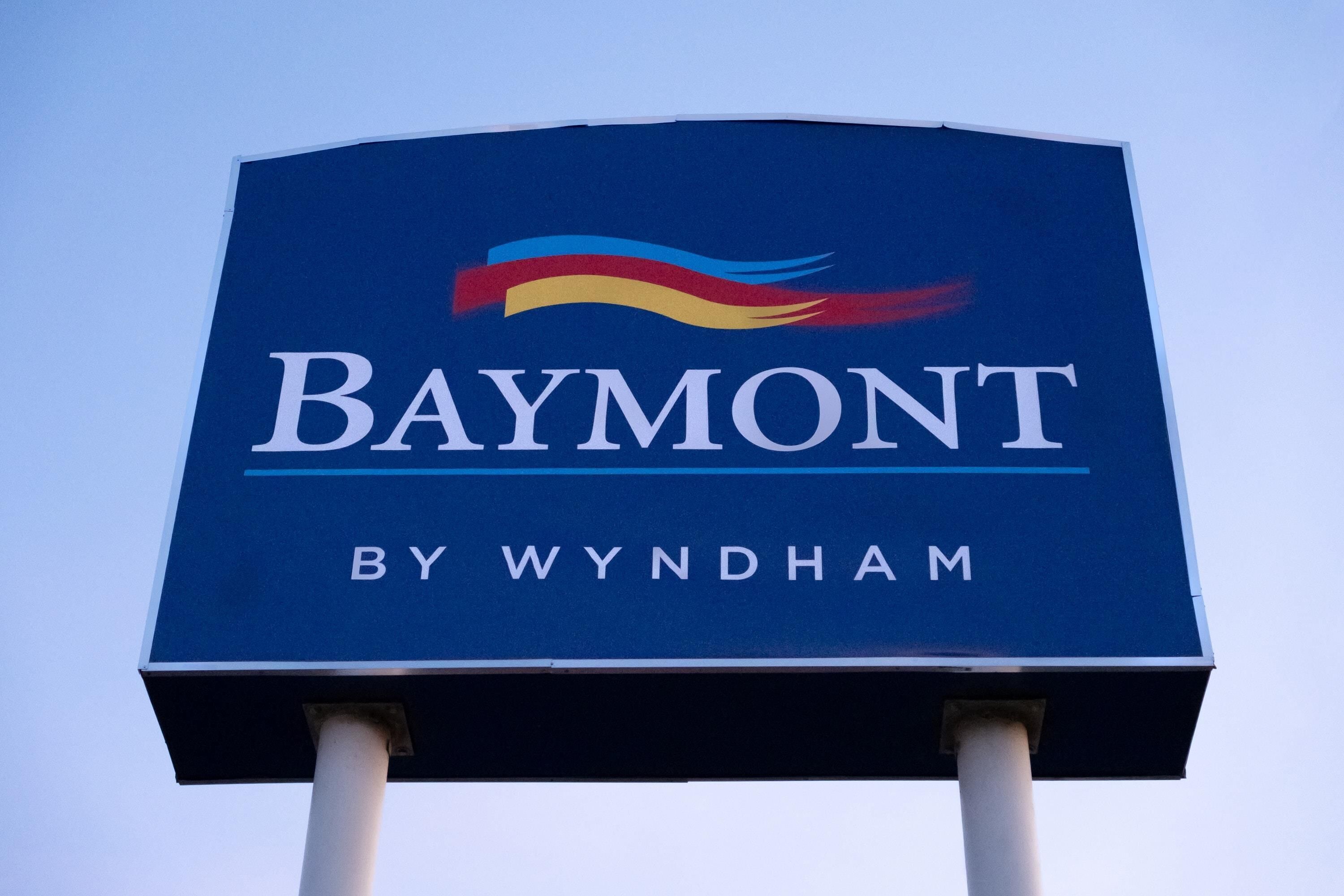 A sign with the text 'Baymont by Wyndham.'