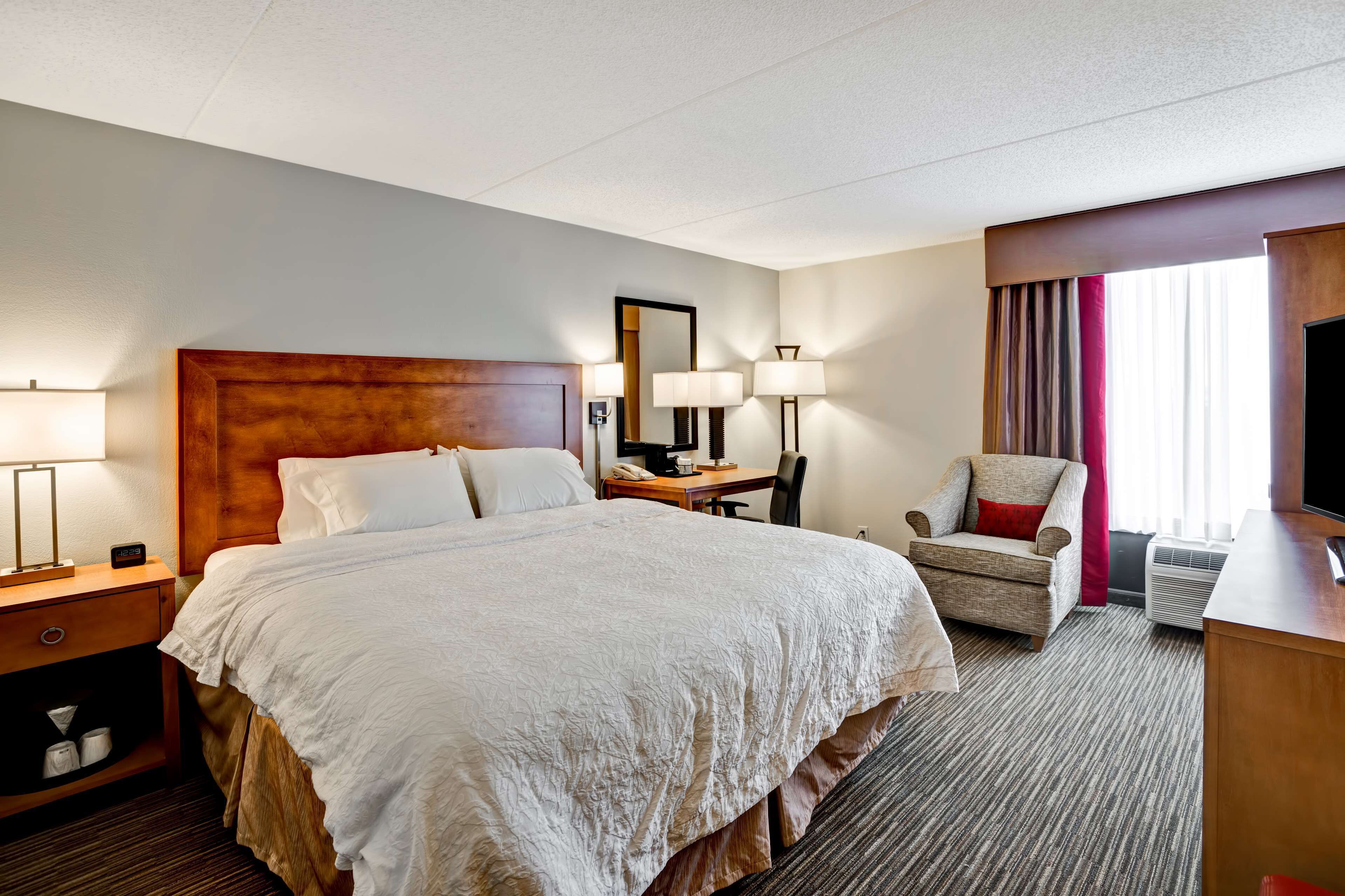 premium bedding, pillow-top beds, desk, blackout curtains