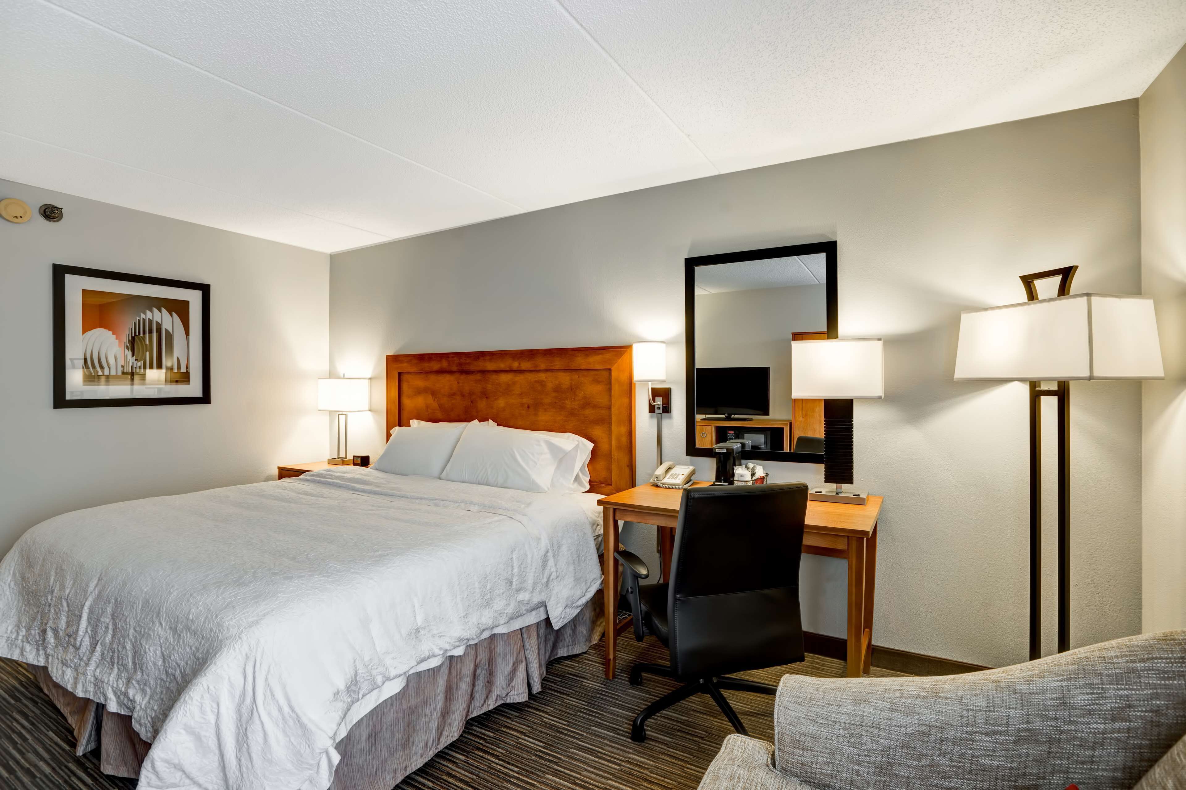 premium bedding, pillow-top beds, desk, blackout curtains