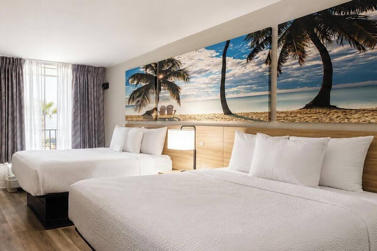 Room, 2 Queen Beds, Non Smoking | In-room safe, desk, laptop workspace, iron/ironing board