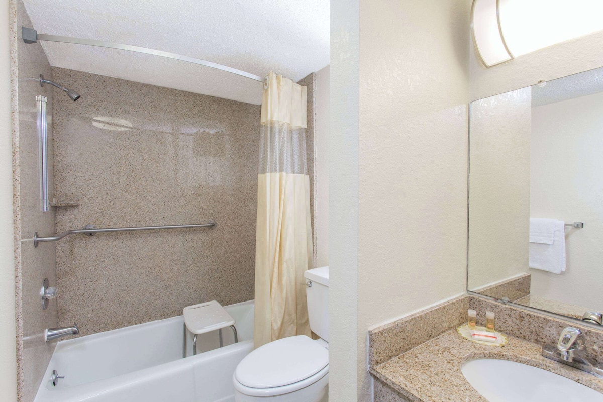 Room, 2 Double Beds, Accessible, Non Smoking (Mobility, Tub w/ Grab Bars) | Bathroom | Deep soaking tub, free toiletries, hair dryer, towels