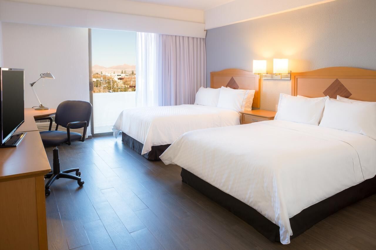 Premium bedding, in-room safe, blackout drapes, iron/ironing board