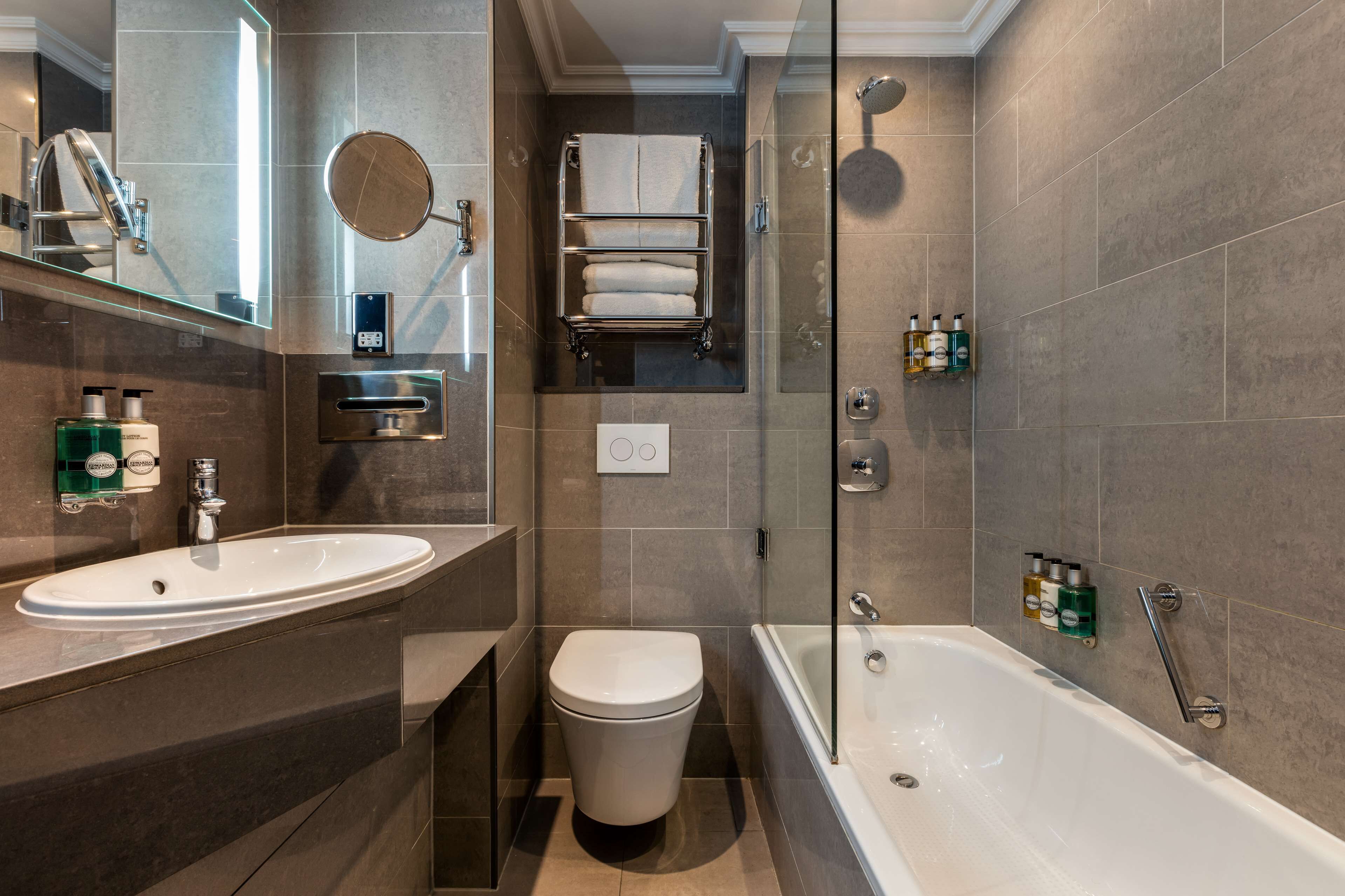 shower, designer toiletries, hair dryer, bathrobes