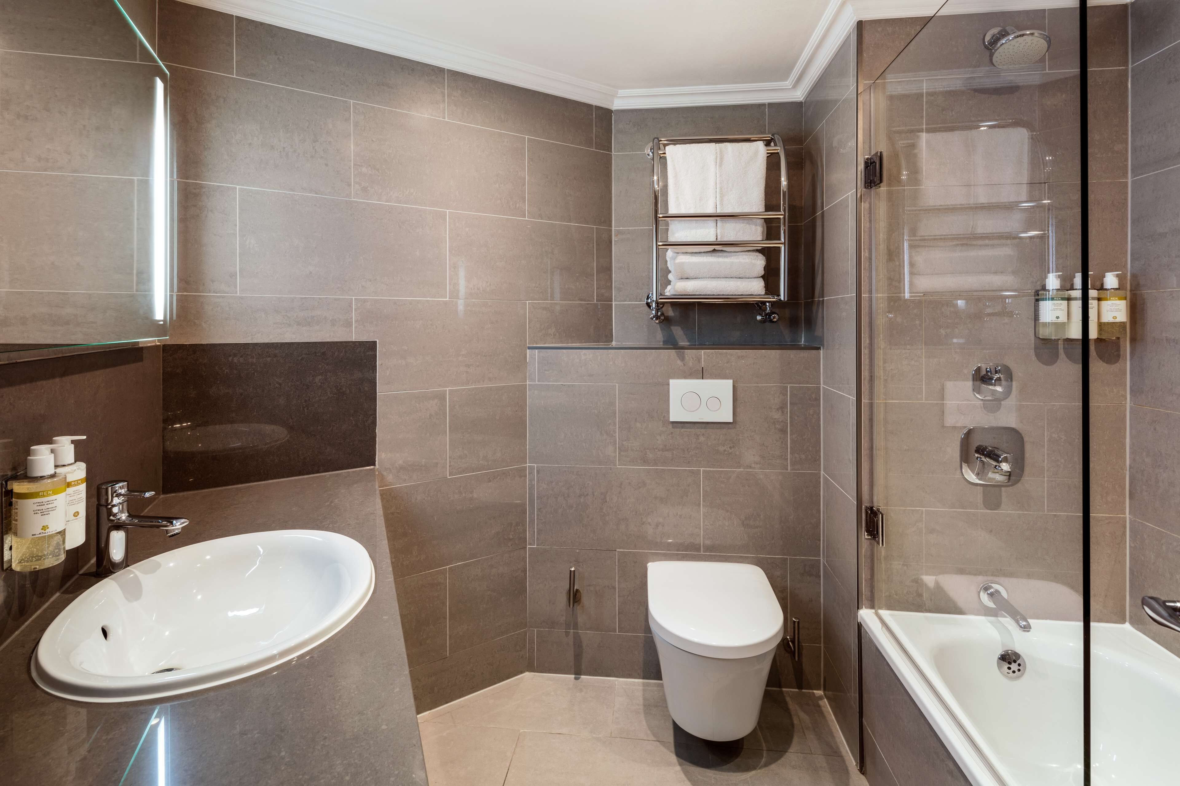 shower, designer toiletries, hair dryer, bathrobes