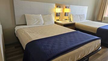 Iron/ironing board, Internet, bed sheets, alarm clocks