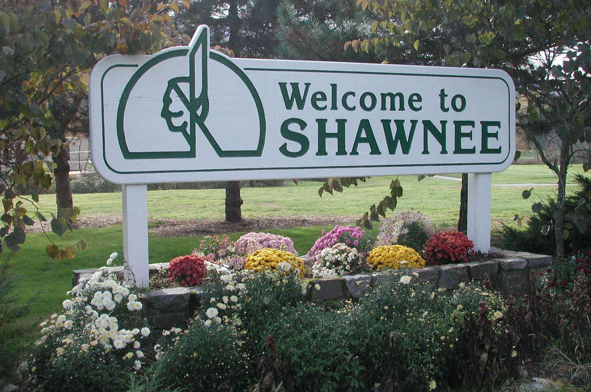 A welcome sign to Shawnee with a profile silhouette and the text "Welcome to SHAWNEE".