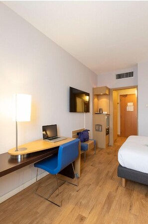 Ropa de cama de alta calidad y minibar 