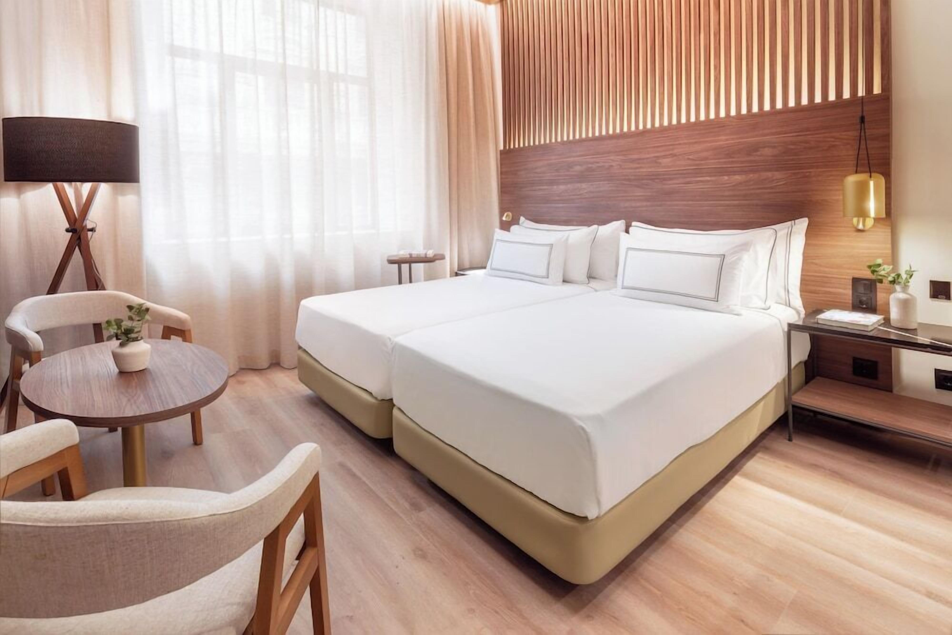 Premium bedding, minibar, in-room safe, blackout drapes