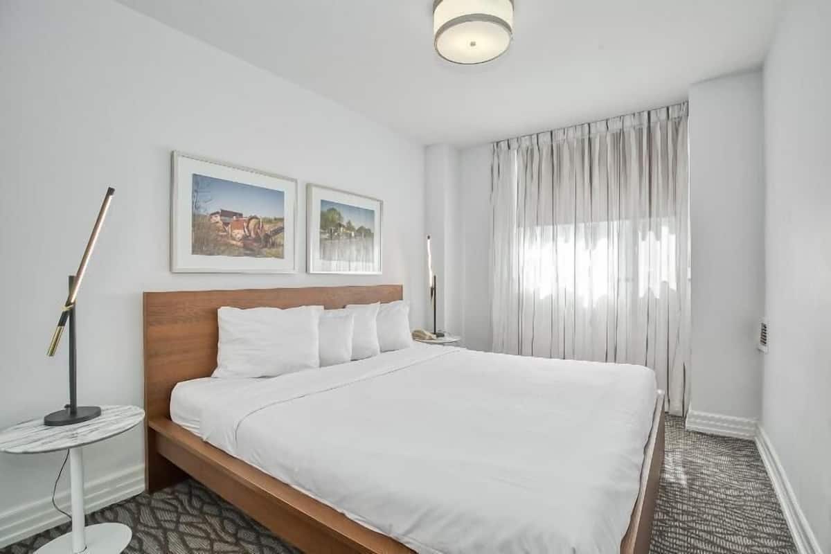 1 bedroom, premium bedding, blackout drapes, iron/ironing board
