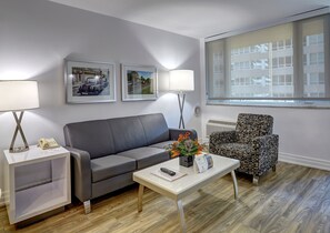 Luxury One Bedroom Suite, 1 King Bed | Living area | Flat-screen TV, pay movies