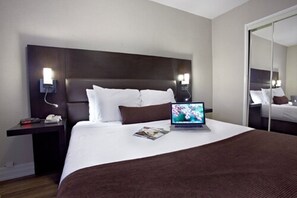 Deluxe One Bedroom Suite | Premium bedding, blackout drapes, iron/ironing board, free WiFi