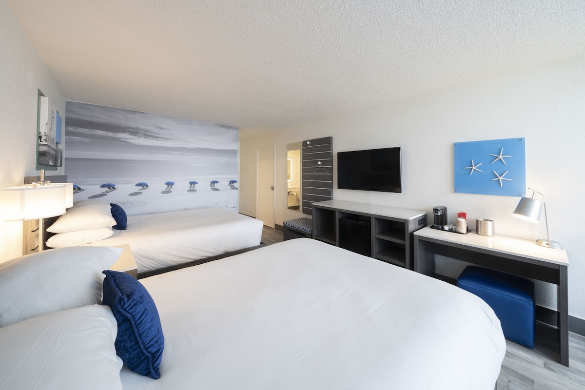 Premium bedding, pillowtop beds, desk, blackout drapes