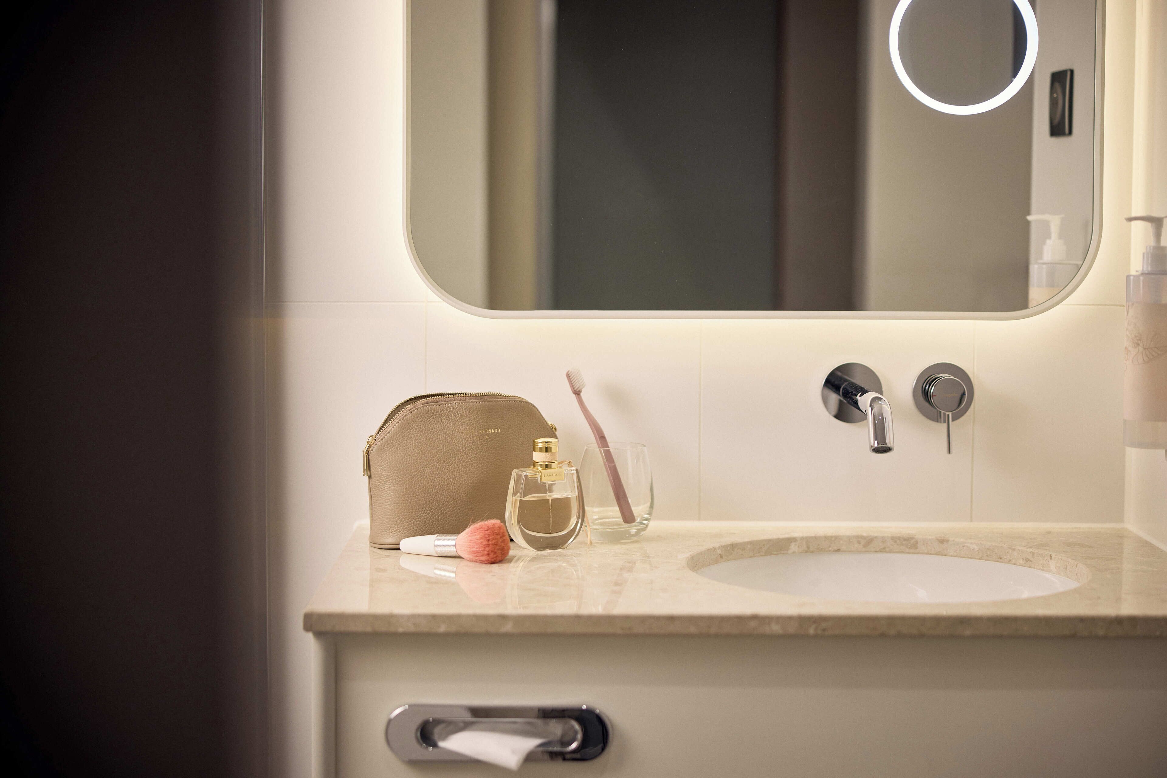 Shower, eco-friendly toiletries, hair dryer, towels