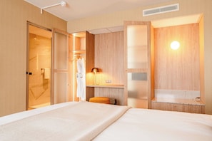 Executive-sviitti | Ylelliset vuodevaatteet, pillowtop-patjalliset sängyt, minibaari