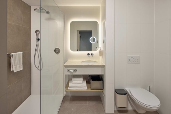 Shower, eco-friendly toiletries, hair dryer, towels
