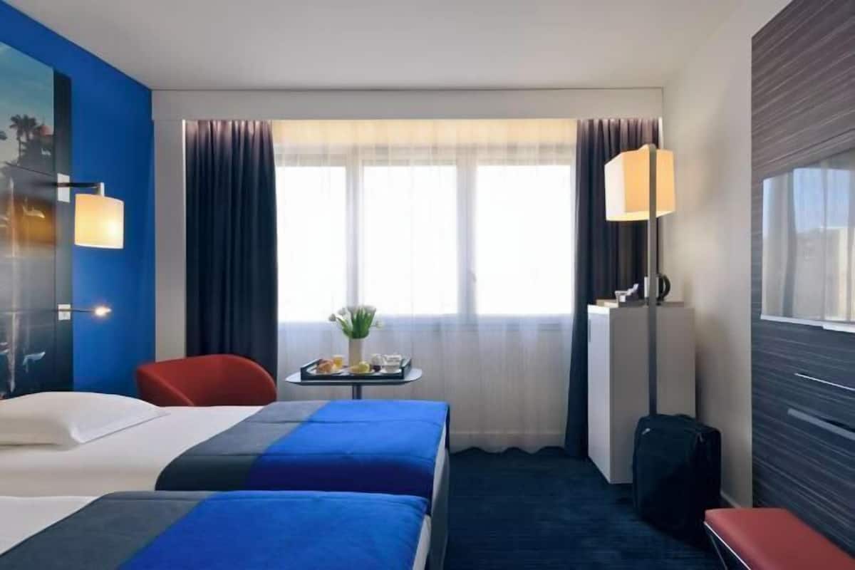 Luxe beddengoed, een kluis op de kamer, een bureau
