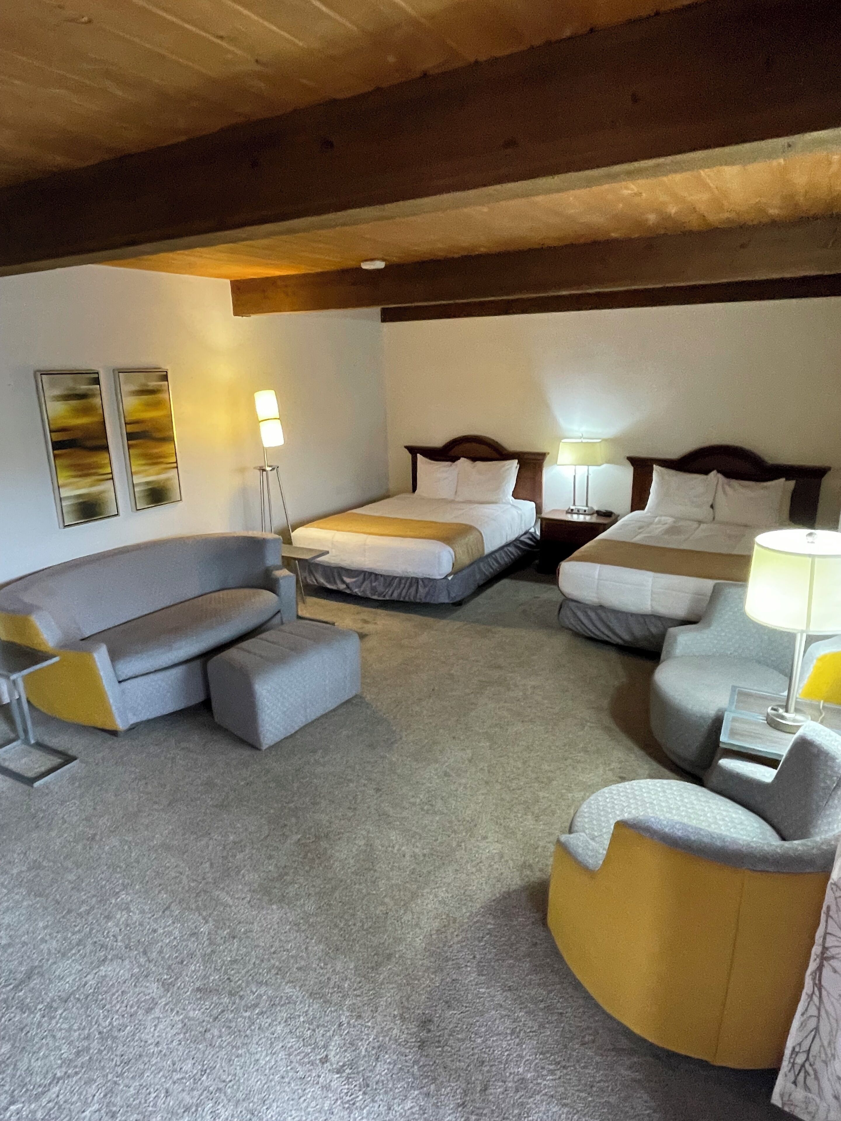 Suite, Multiple Beds, Non Smoking | Individually furnished, desk, iron/ironing board, free WiFi