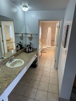 Suite, Multiple Beds, Non Smoking | Bathroom | Combined shower/bathtub, hair dryer, towels