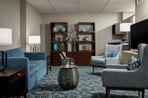 Presidential Suite, 1 Bedroom, Non Smoking | Living room | TV, video-game console, pay movies
