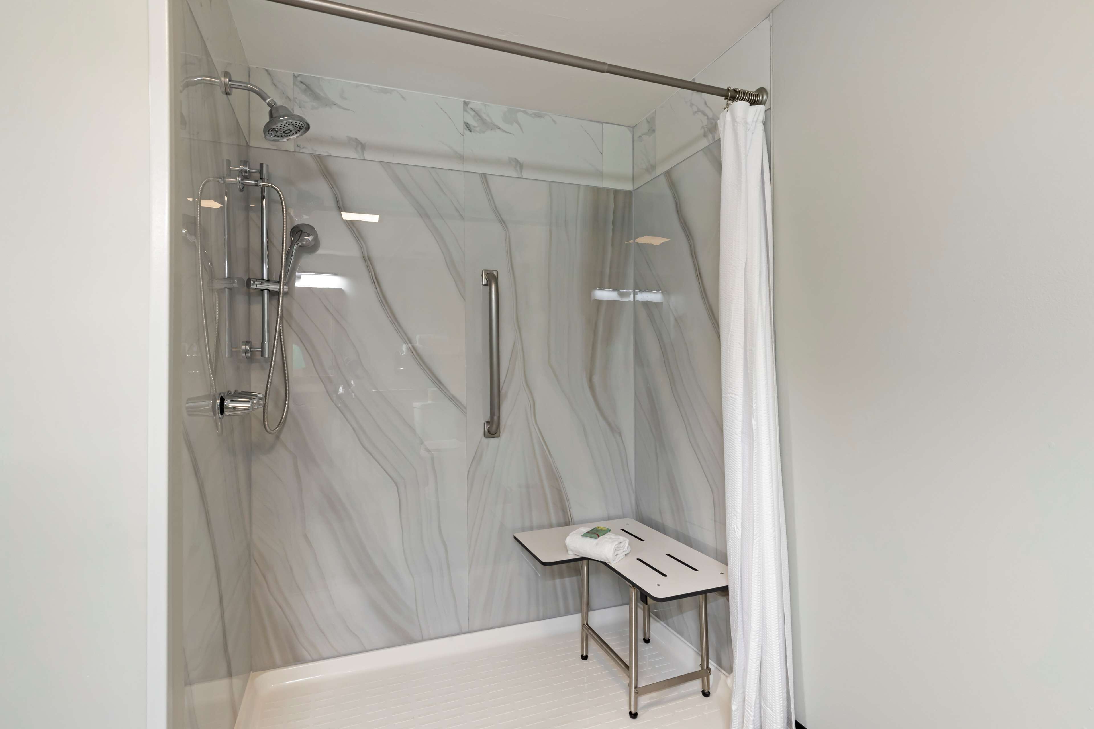 standard room, 1 king bed, accessible, refrigerator & microwave (refrigerator & microwave) | bathroom | combined shower/bathtub, eco-friendly toiletries, hair dryer, towels