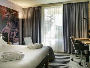 Habitación ejecutiva, 1 cama matrimonial | Ropa de cama de alta calidad y minibar 