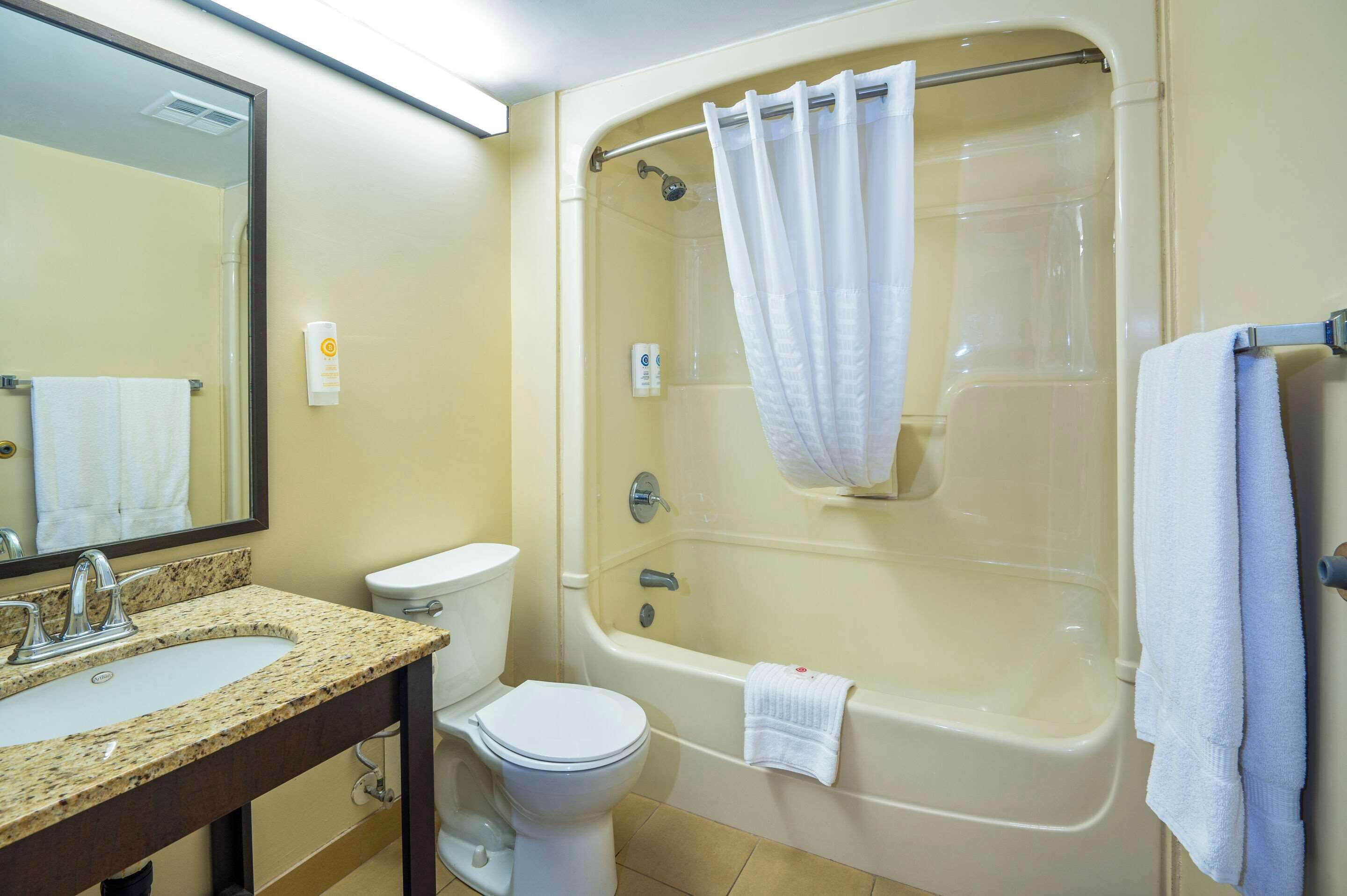 desk, blackout curtains, iron/ironing board, rollaway beds