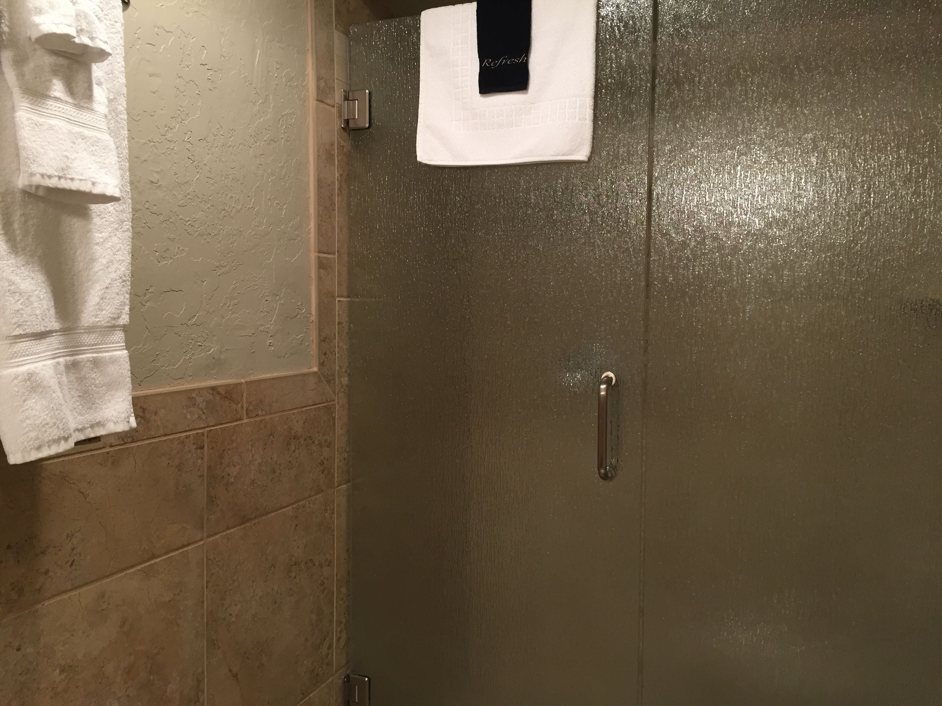 eco-friendly toiletries, hair dryer, towels, soap