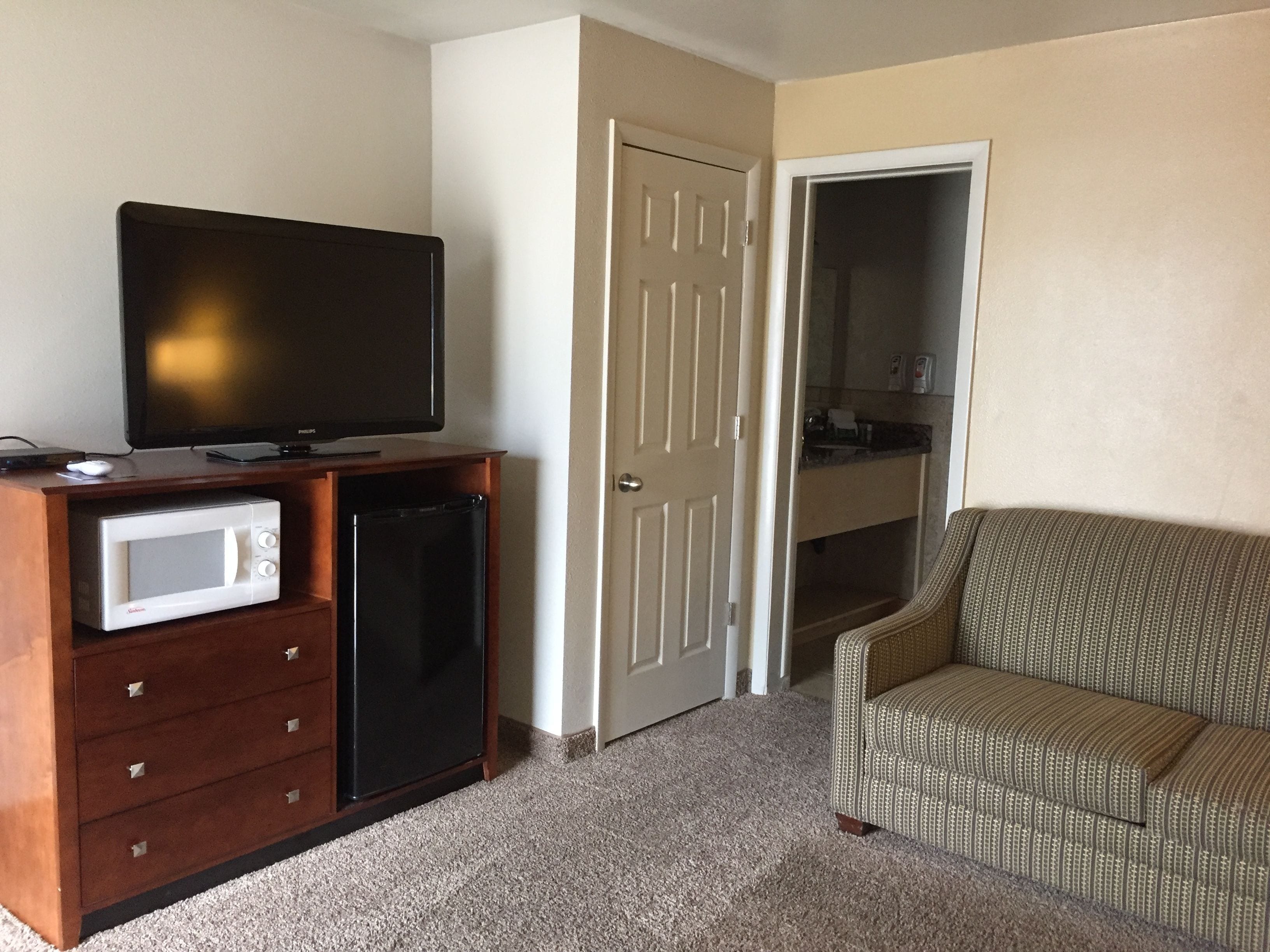 deluxe room, 1 king bed with sofa bed (premier 1 king bed) | hypo-allergenic bedding, iron/ironing board, travel cot, free wifi