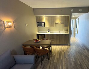 Suite, 1 King Bed, Non Smoking | In-room safe, desk, laptop workspace, blackout curtains