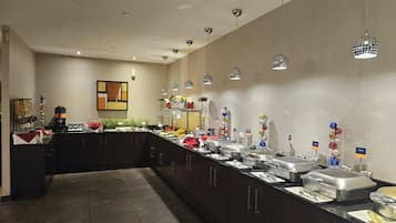 Breakfast, dinner served; local cuisine, pool views