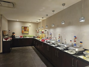 Breakfast, dinner served; local cuisine, pool views