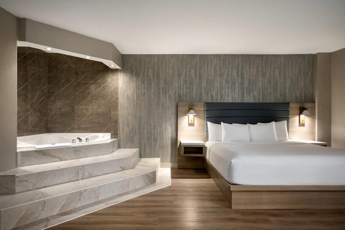 Suite, 1 King Bed, Non Smoking | In-room safe, desk, laptop workspace, blackout drapes