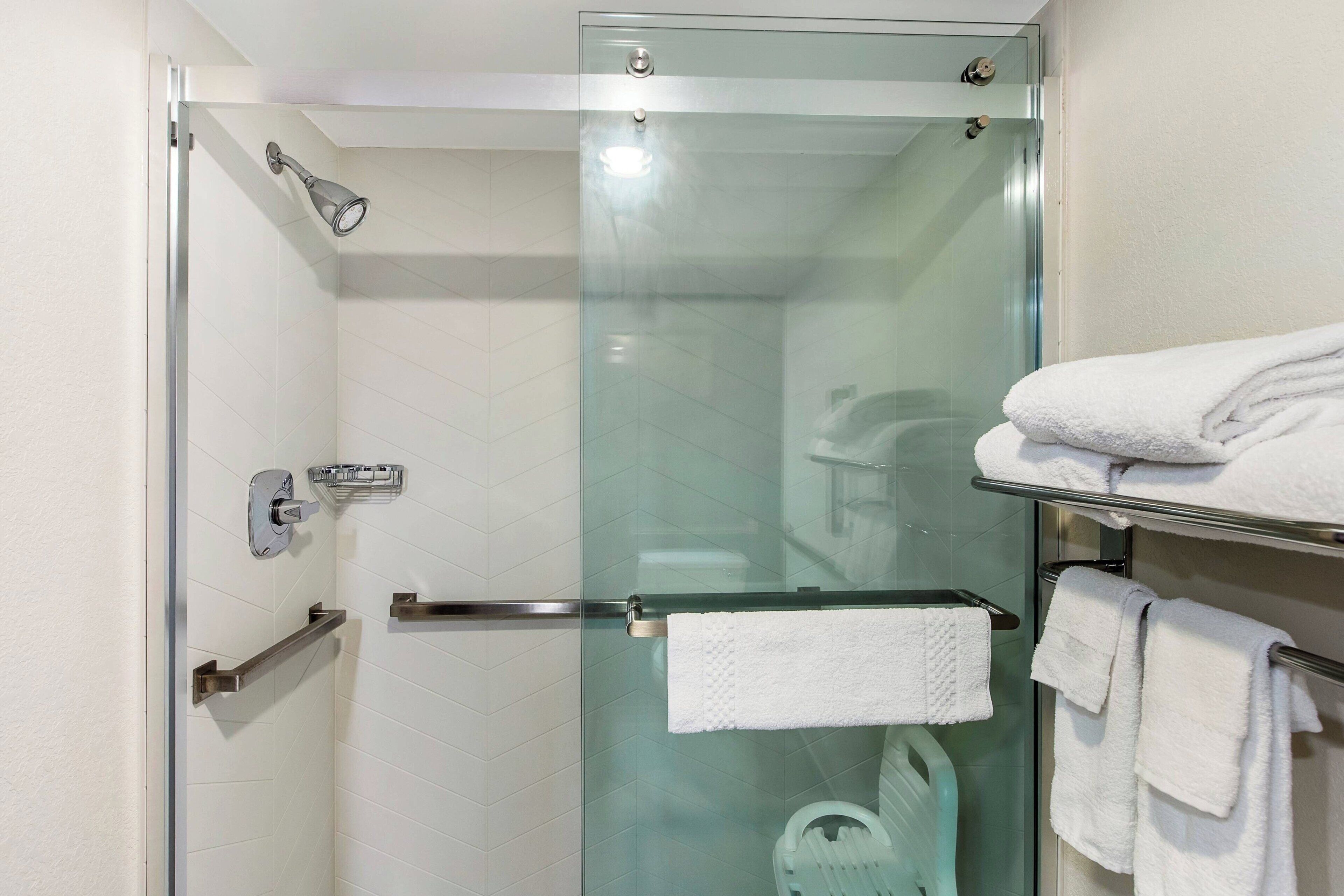 combined shower/bathtub, free toiletries, hair dryer, towels