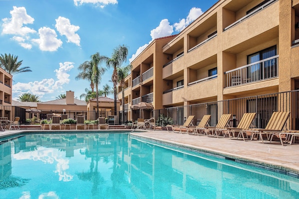 Outdoor pool, open 6:00 AM to 9:00 PM, pool umbrellas, pool loungers