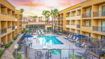 Outdoor pool, open 6:00 AM to 9:00 PM, pool umbrellas, sun loungers