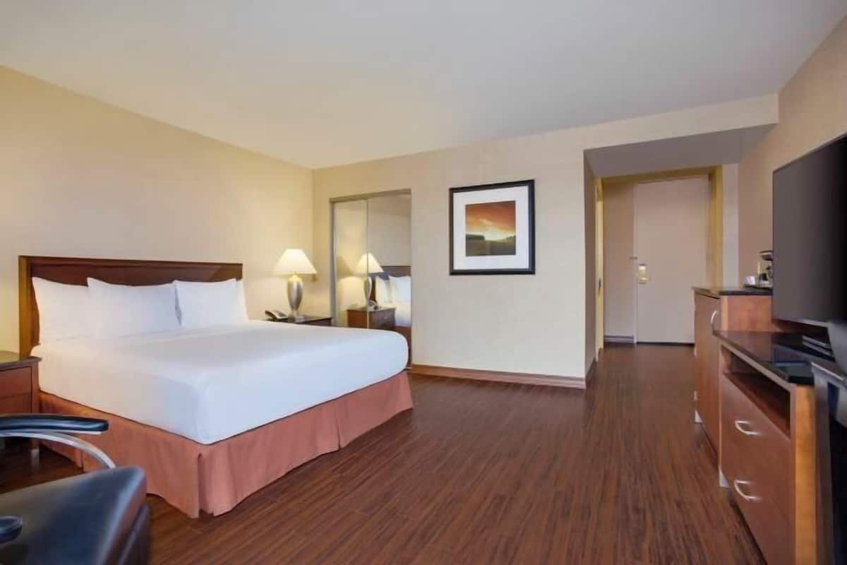 Premium bedding, down duvets, pillow-top beds, in-room safe